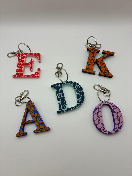 Tiki flower letter keyrings