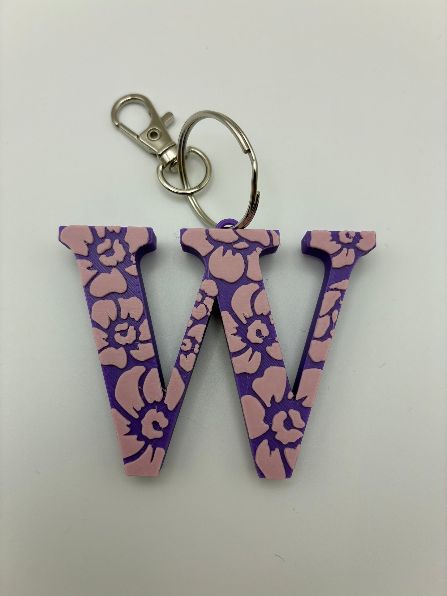 Tiki flower letter keyrings