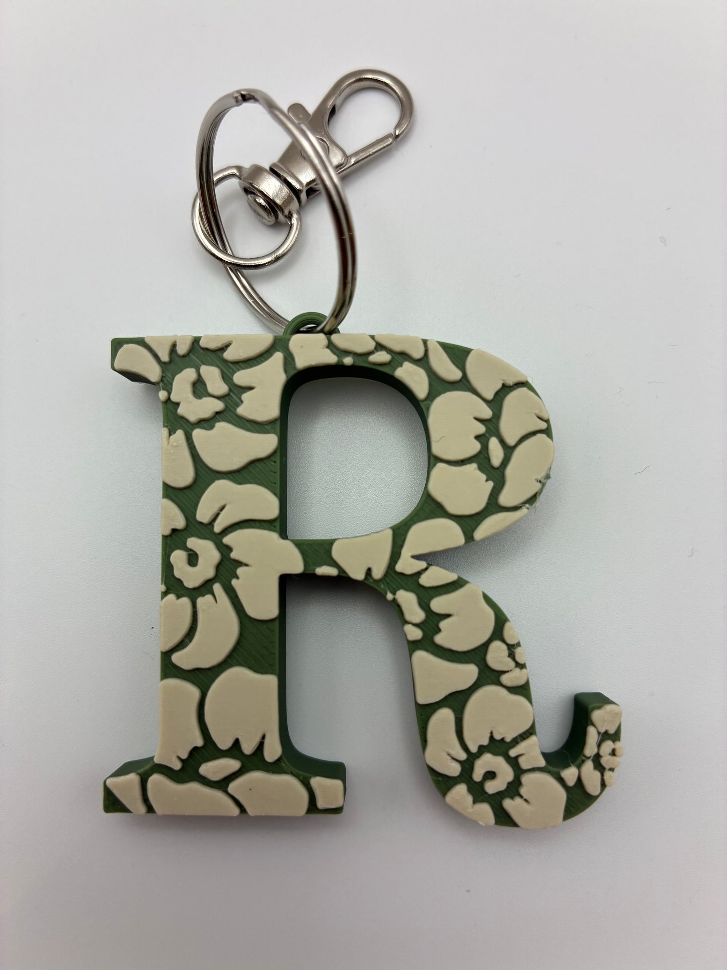 Tiki flower letter keyrings